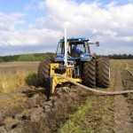 gold digger drain plow in action