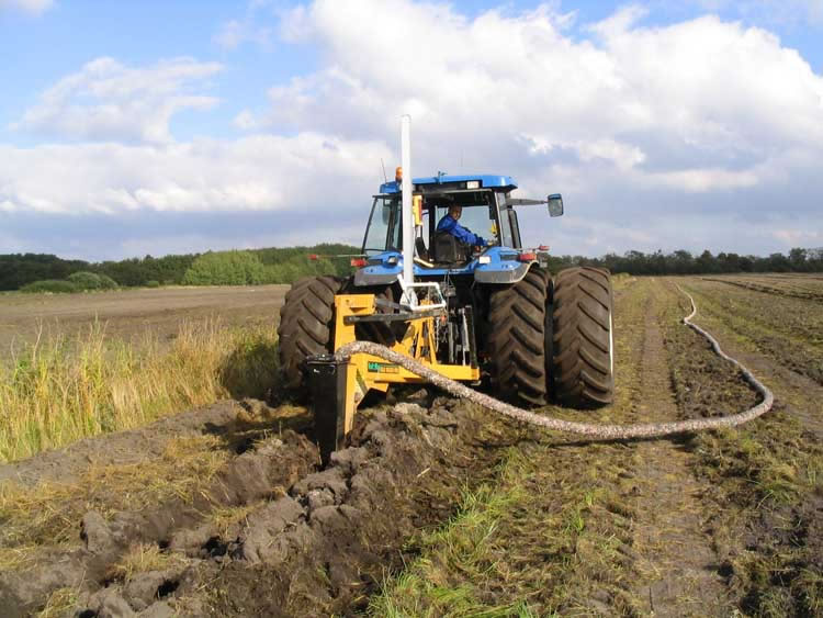 gold digger drain plow in action